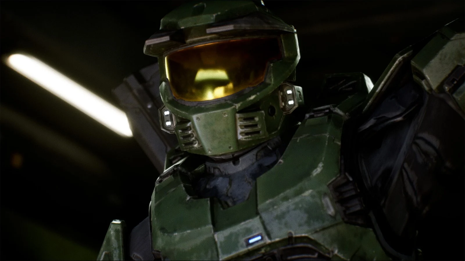 Un primo piano di Master Chief, rappresentato con l'iconico casco verde con visiera gialla, della serie Halo.